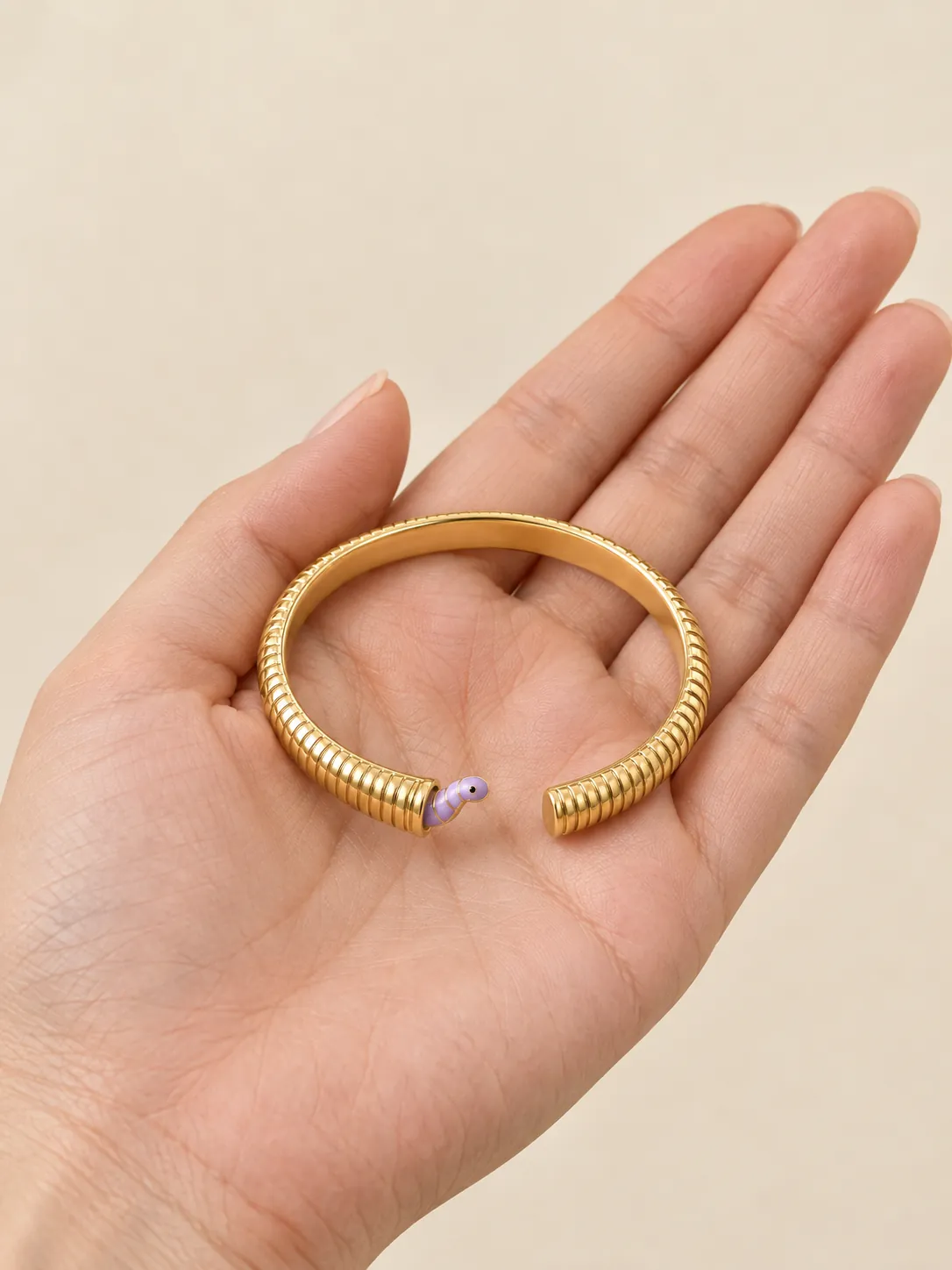 Bookworm Cuff — In the hand, for scale