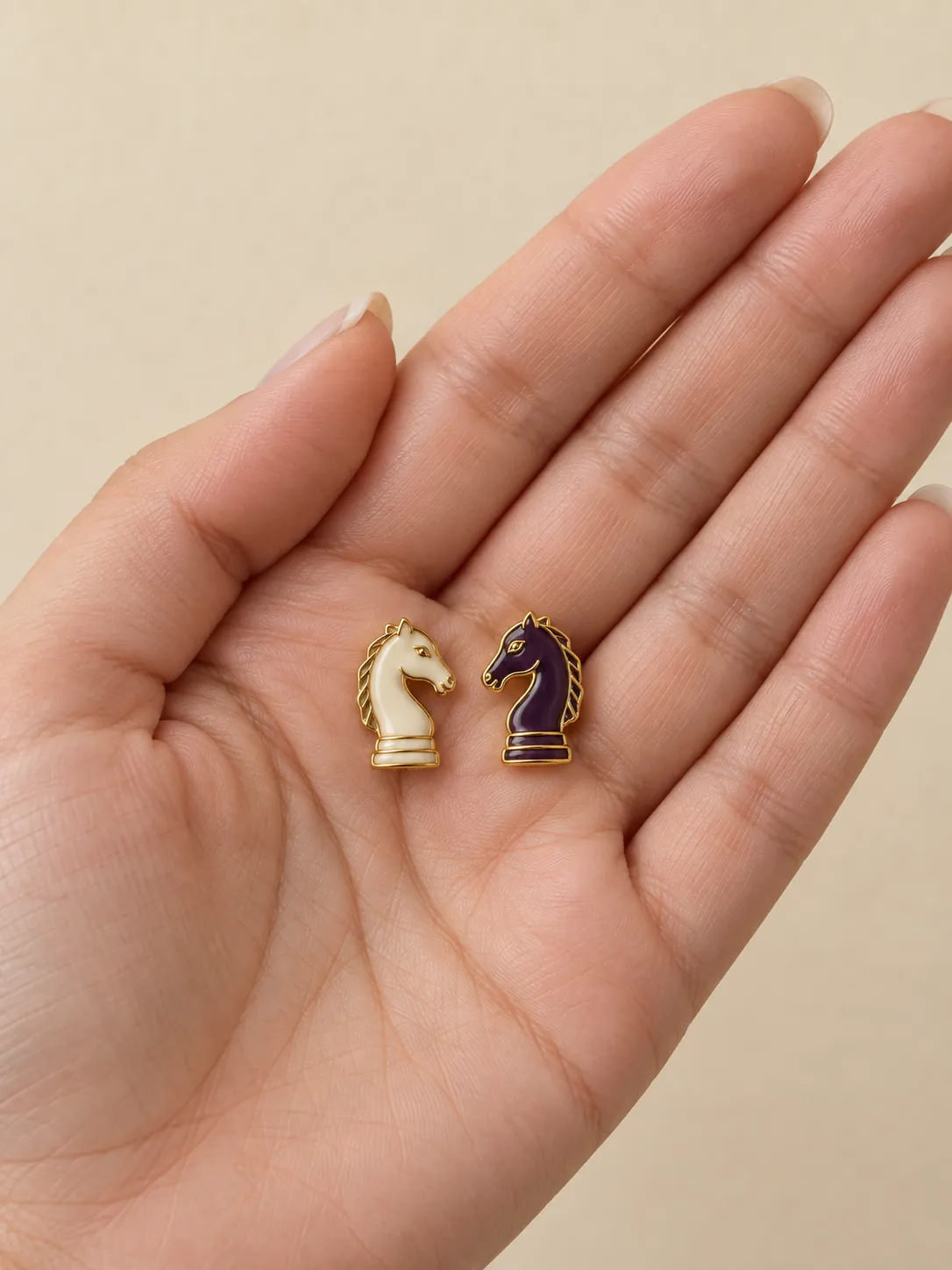 Chess Knight Studs — In the hand, for scale