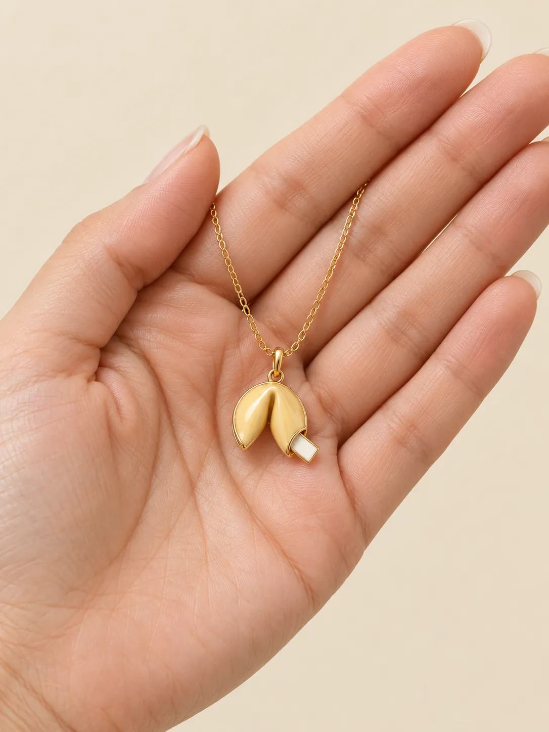 Fortune Cookie Pendant — In the hand, for scale