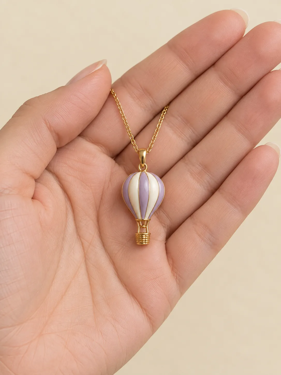 Hot Air Balloon Pendant — In the hand, for scale