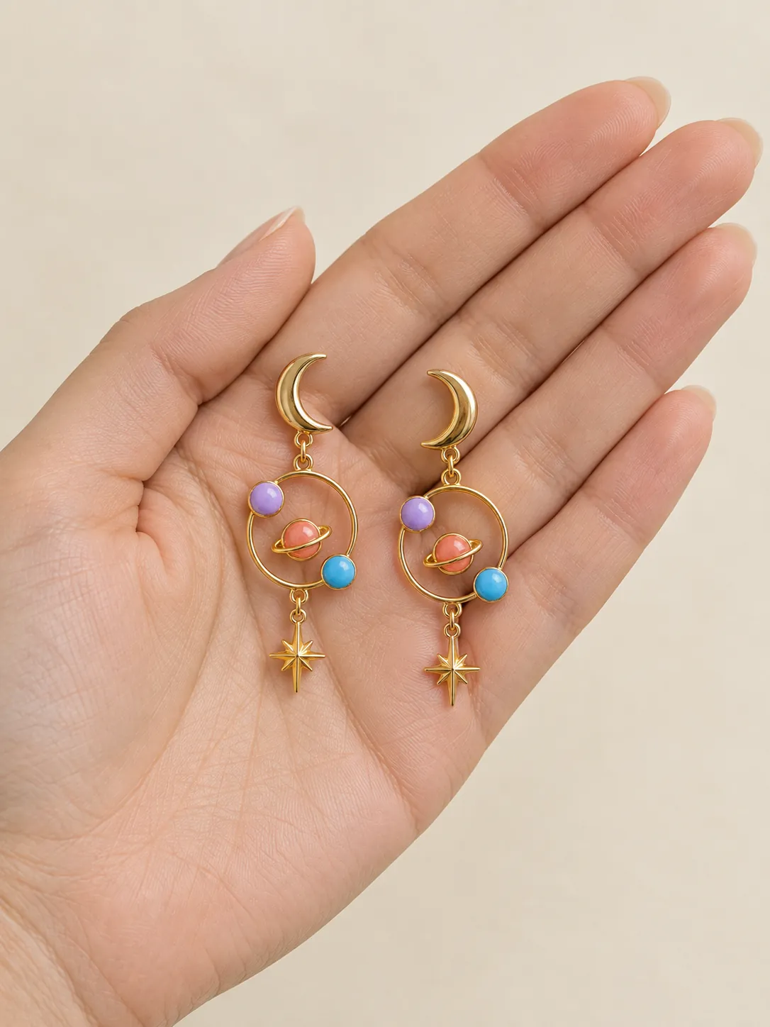 Little Orbit Statement Drops — In the hand, for scale