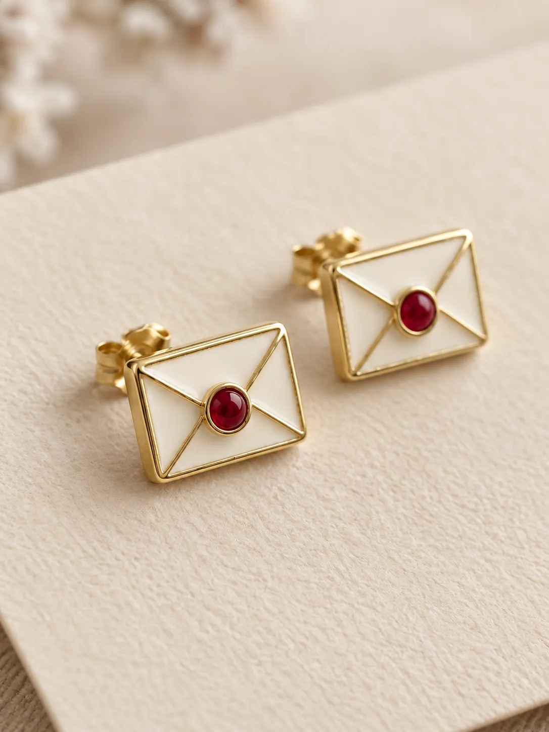 Sealed Letter Studs — Close-up detail