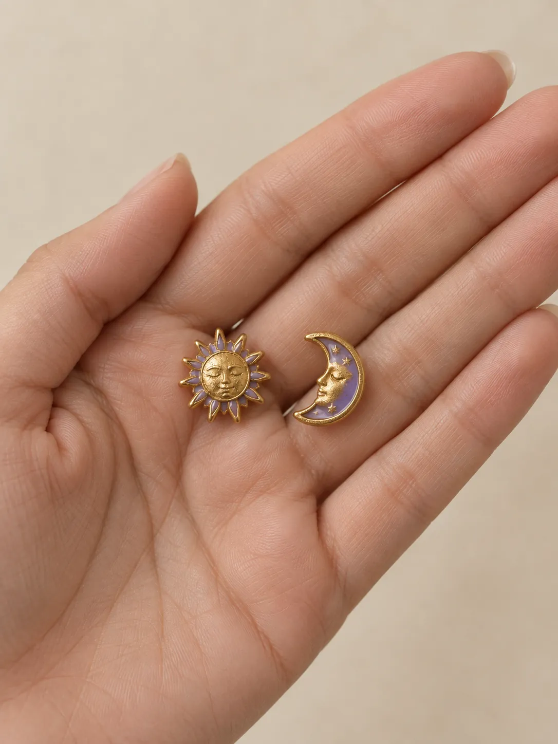 Sun & Moon Mismatched Studs — In the hand, for scale